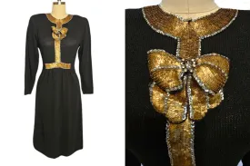 *  VINTAGE LILLIE RUBIN BLACK KNIT EVENINGS DRESS WITH HUGE GOLD AND SILVER SEQUIN BOW ACCENTED WITH SPARKLING RHINESTONES