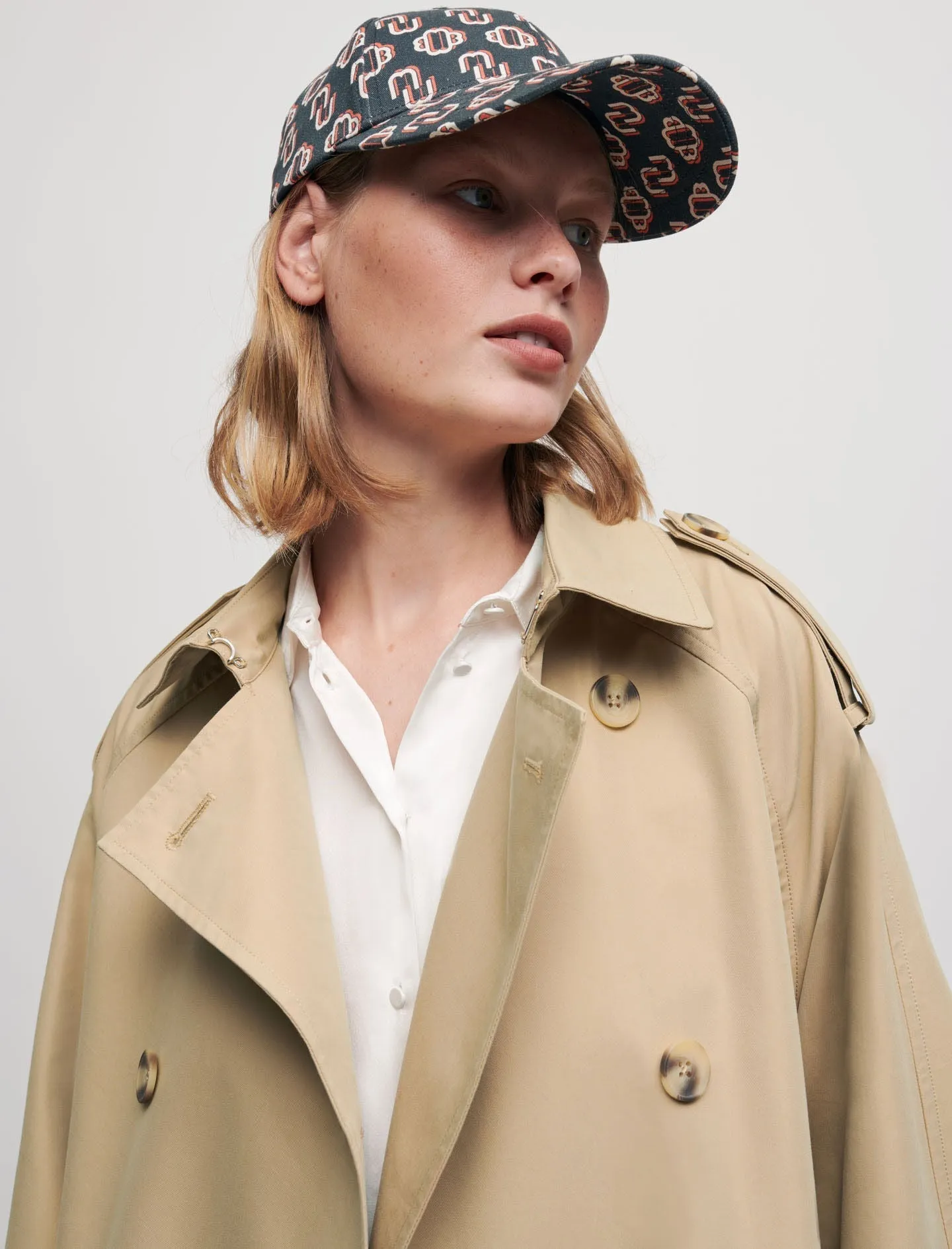 BELTED TRENCH COAT WITH LEATHER PATCHES